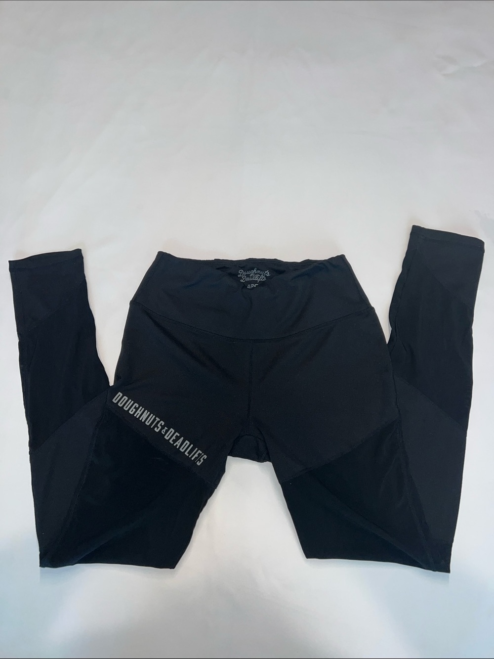Doughnuts & Deadlifts Black leggings with see through mesh details size large